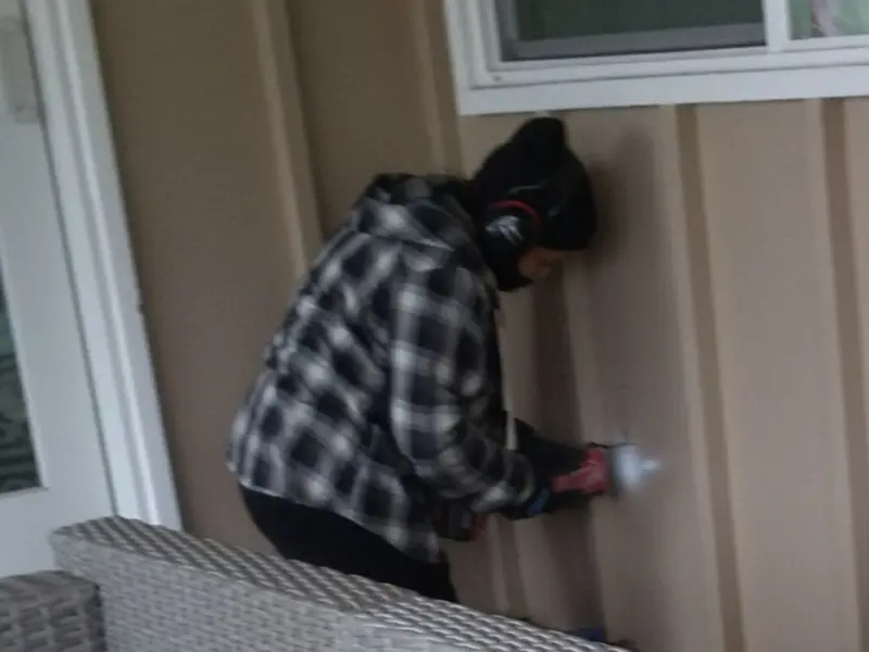 Professional electrician installing an exterior outlet in Atlantic City